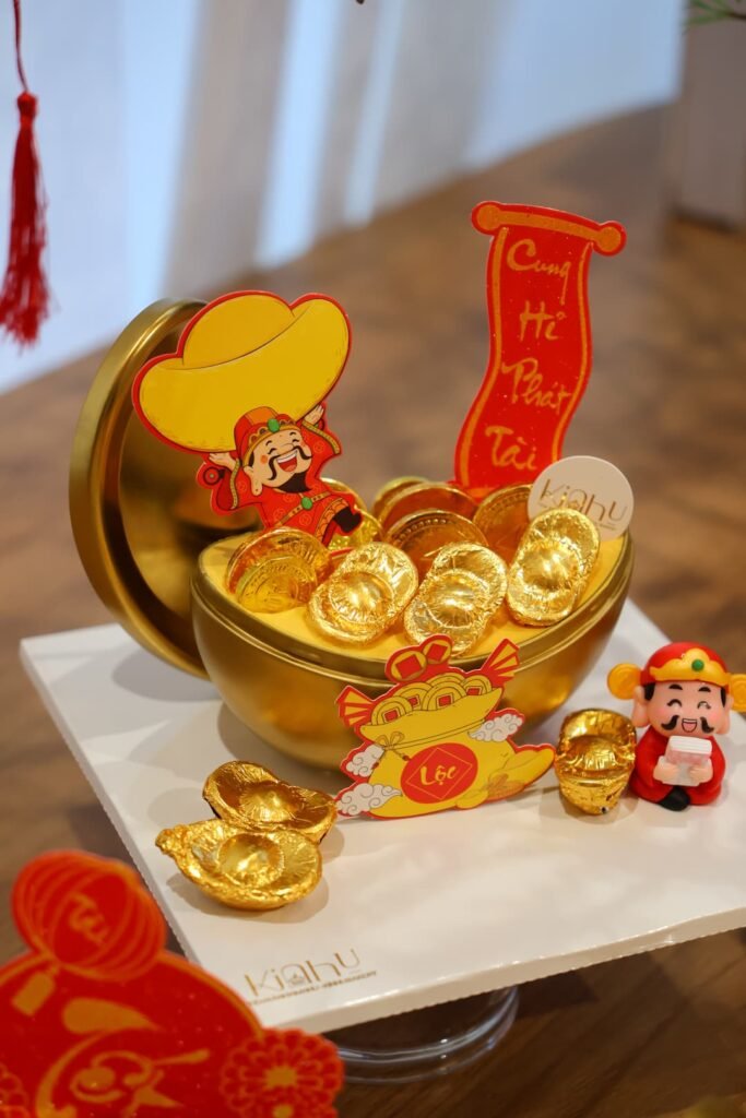 Bánh kem thỏi vàng khai trương